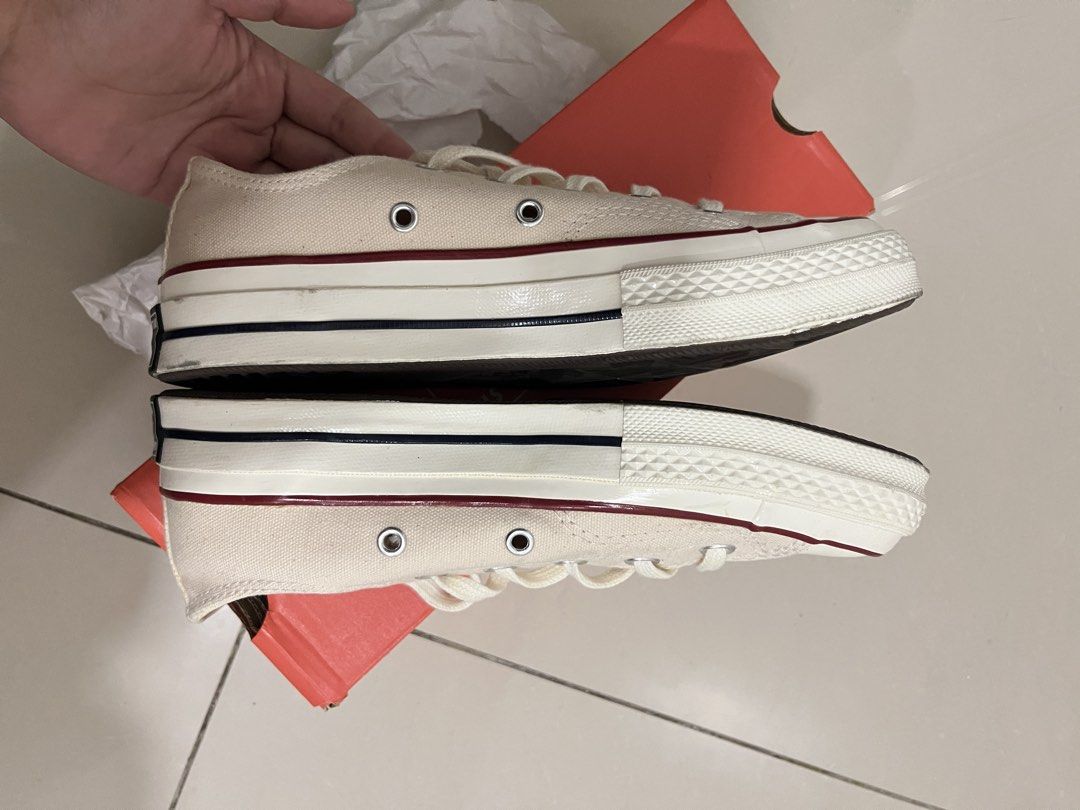 Converse Chuck 70 Ox Parchment Garnet Egret (Category: Sneakers) located in Mandaluyong City. Submitted by janellemarieeeee (Listing ID 1467290456, Image 3). Description: - Brand: Converse Chuck 70 Low Top - Colorway: Parchment Canvas with contrast garnet piping & black foxing stripe - Size: Men US 4 / Women US 6 / UK 4 / EUR 36.5 / 23 cm - Comfort: Equipped with OrthoLite insole for all-day cushioning - Inclusions: Comes with original orange sho