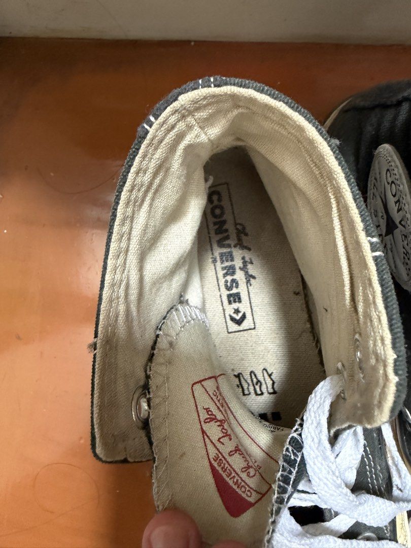 Converse Chuck Taylor All Star 70s High Top (Category: Sneakers) located in Makati City. Submitted by chewyy.j (Listing ID 1467191219, Image 3). Description: - Color: Black canvas with white laces and cream rubber soles - Design: High-top with classic Chuck Taylor inner ankle patches and heel branding - Condition: Shows gentle signs of wear on the canvas and soles - Durability: Sturdy and dependable, perfect for everyday casual wear.