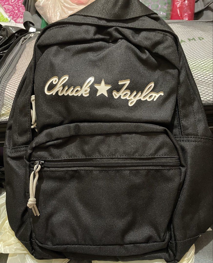 Converse Chuck Taylor Black Backpack (Category: Backpacks) located in Quezon City. Submitted by stuffsrus (Listing ID 1467189471, Image 1). Description: Black canvas backpack from Converse. Large white Chuck Taylor cursive script logo stamped across the front pocket. Front zipper pocket with off-white knotted cord pull. Sturdy black fabric construction with padded straps. Great everyday size for school, work, or casual outings.authentic converse 