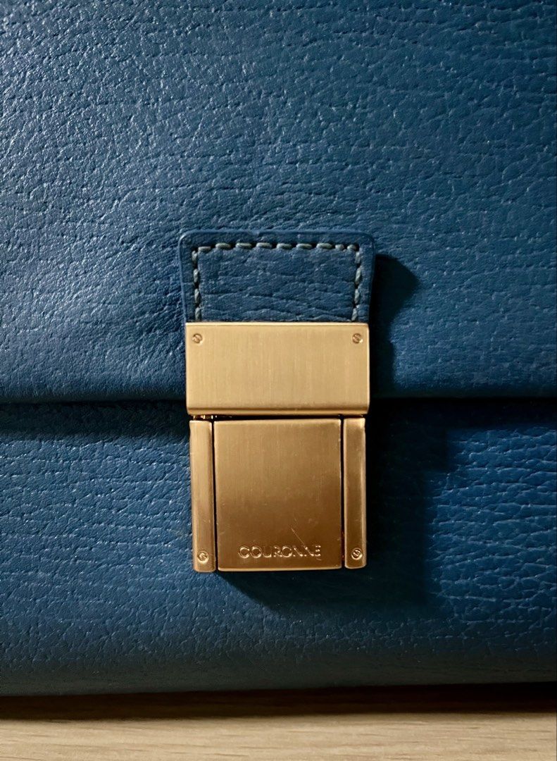 Couronne Satchel (Category: Clutches) located in Quezon City. Submitted by madshoppe (Listing ID 1467281392, Image 3). Description: No flaws Med to Large size for a top handle bag Teal color With sling Super pretty in person.