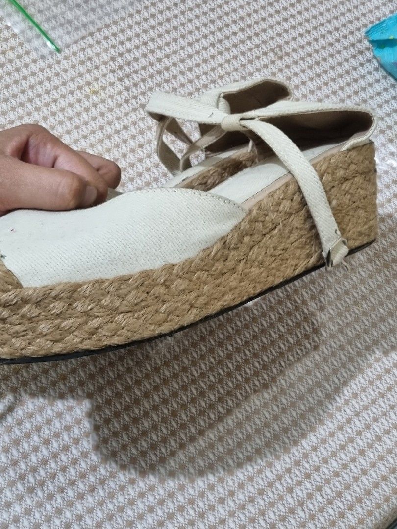 Cream Espadrille Wedge Sandals with Ankle Strap (Category: Wedges) located in Quezon City. Submitted by gabdclutz (Listing ID 1467234625, Image 2). Description: - Style: Cream canvas espadrille wedges with closed round toe - Closure: Ankle strap with adjustable buckle - Heel: Classic jute-wrapped wedge - Versatility: Comfortable height, perfect for summer outfits - Condition: Pre-loved with visible dirt marks on the insoles and toe area ❗️❗️PAYME