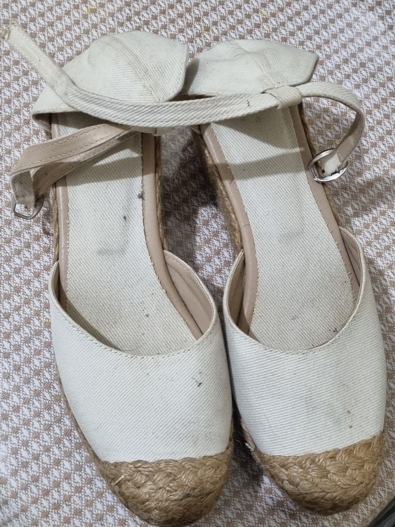 Cream Espadrille Wedge Sandals with Ankle Strap (Category: Wedges) located in Quezon City. Submitted by gabdclutz (Listing ID 1467234625, Image 1). Description: - Style: Cream canvas espadrille wedges with closed round toe - Closure: Ankle strap with adjustable buckle - Heel: Classic jute-wrapped wedge - Versatility: Comfortable height, perfect for summer outfits - Condition: Pre-loved with visible dirt marks on the insoles and toe area ❗️❗️PAYME
