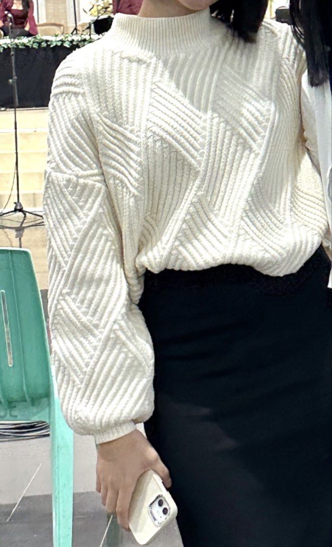 Cream Geometric Pattern Mock Neck Knit Sweater (Category: Longsleeves) located in Ozamiz City. Submitted by icadls (Listing ID 1467123472, Image 1). Description: - Color: Cream with a stylish geometric diagonal pattern - Fit: Relaxed fit with dropped shoulders and cropped length - Details: Ribbed mock neck collar and cuffs, soft textured knit fabric - Versatility: Great layering piece for cooler weather, perfect with high-waisted jeans or skirts.