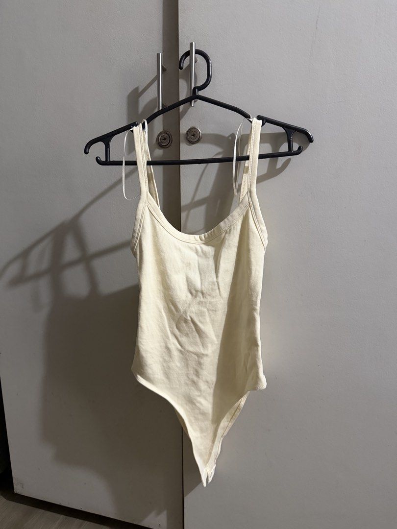 Cream Ribbed Bodysuit Tank Top (Category: Sleeveless) located in Manila. Submitted by karely (Listing ID 1467241964, Image 1). Description: used once.