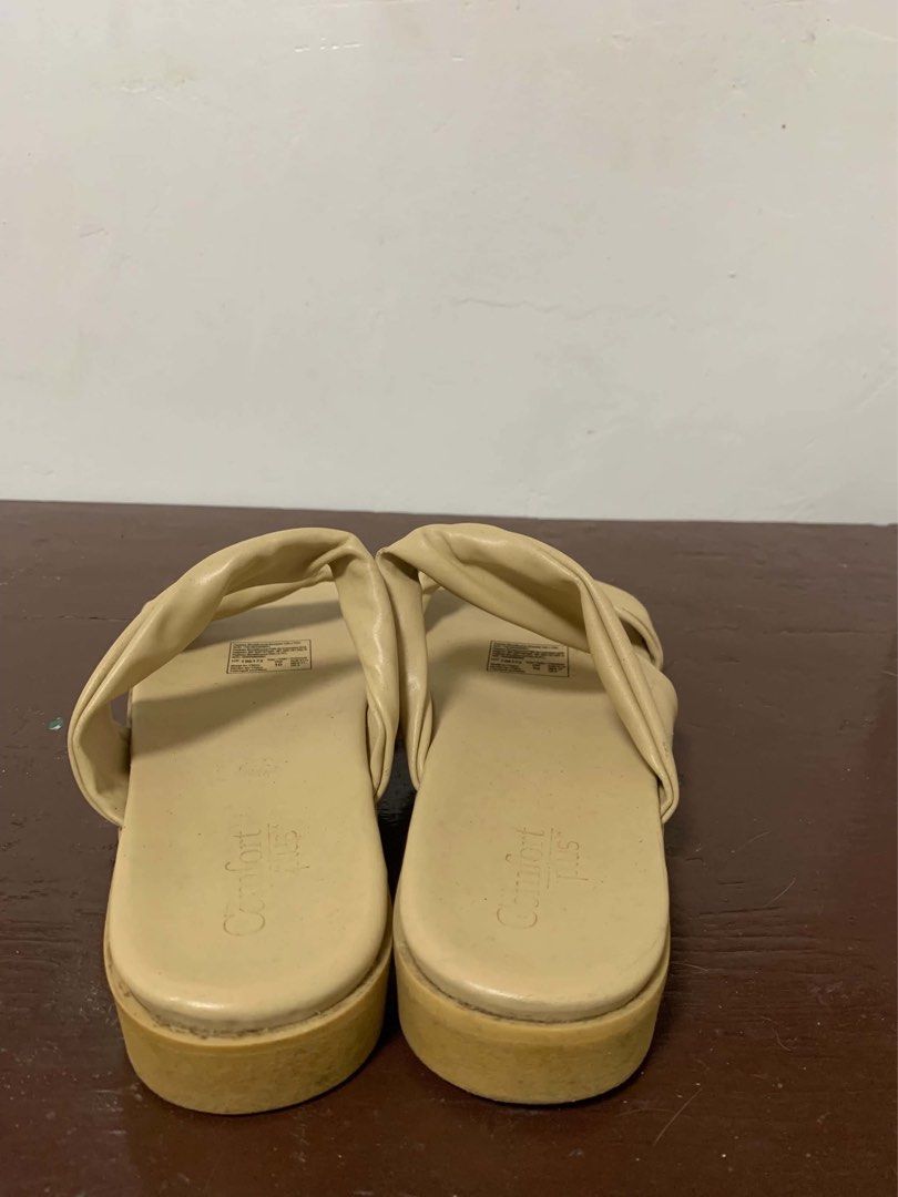 Cream Sandals size 10W (wide) (Category: Flats & Sandals) located in Borongan. Submitted by kabes_jane (Listing ID 1467188915, Image 3). Description: - Color: Cream - Style: Slip-on sandals with twisted strap design - Size: 10 US - Condition: Clean, brand new, and ready to wear - Ideal for: Casual daily wear, beach trips, and warm weather outfits.