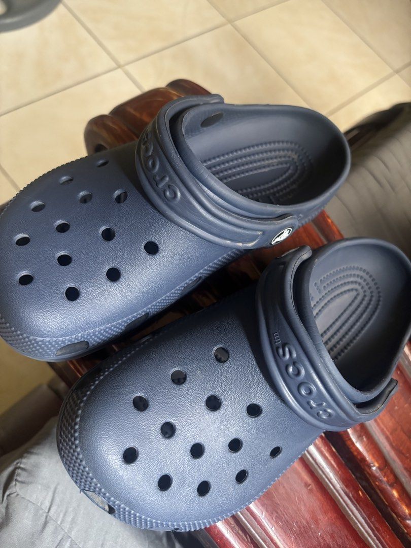 Crocs Classic Clog Navy M4W6 (Category: Slippers & Slides) located in Antipolo. Submitted by jennibee (Listing ID 1467201375, Image 2). Description: - Item: Navy blue Crocs Classic Clogs - Size: M4 / W6 - Source: Bought directly from the Crocs official online store - Features: Iconic ventilation ports, secure heel straps, and lightweight foam construction - Condition: Worn a few times with slight scuff marks on the soles, but overall plenty of li