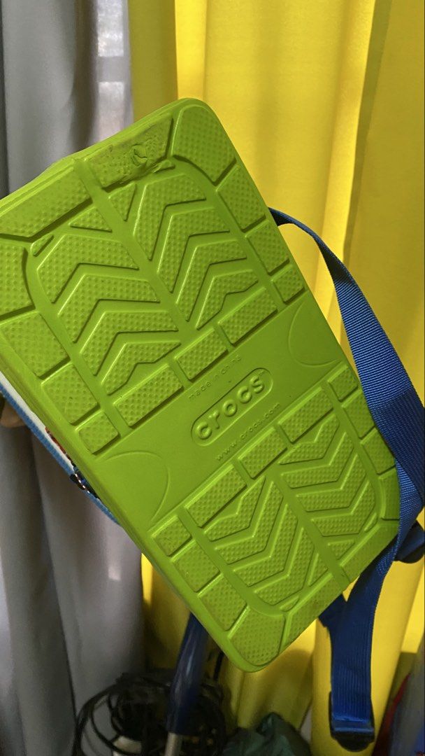 (Bundle) 2 Crocs Novelty Backpack Green and Blue Kids Bag (Category: Babies & Kids Fashion) located in Pagadian. Submitted by preowneditems01 (Listing ID 1467169115, Image 3). Description: - crocs backpack with iconic shoe sole base - Secure zip closure around the middle (functional) - Adjustable shoulder straps for a comfortable fit - Perfect unique bag for school, travel, or casual outings - bundle .
