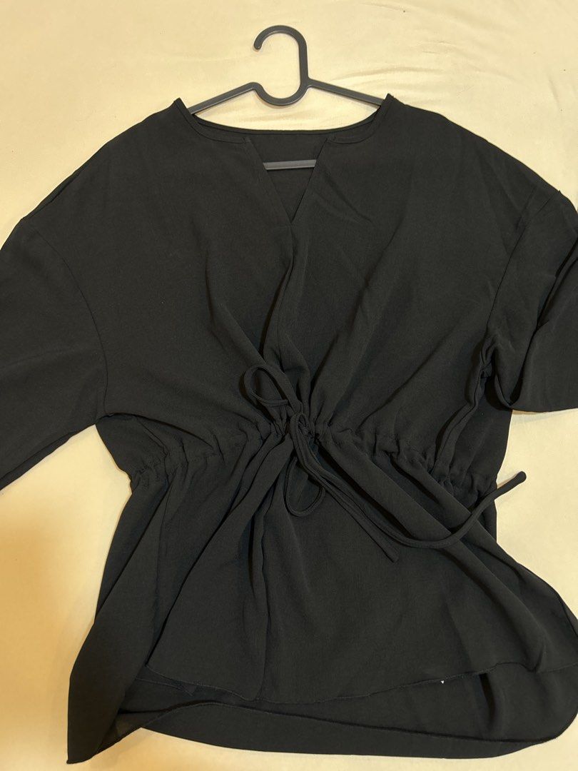 DAZY SHEIN Black Long Sleeve Blouse with Drawstring Waist (Category: Blouses) located in Quezon City. Submitted by kyokoaman (Listing ID 1467301714, Image 2). Description: Black long sleeve blouse with a v-neckline. Drawstring waist lets you adjust the fit easily. Sleeves have ruffled cuffs. Lightweight fabric, great for layering or wearing on its own..
