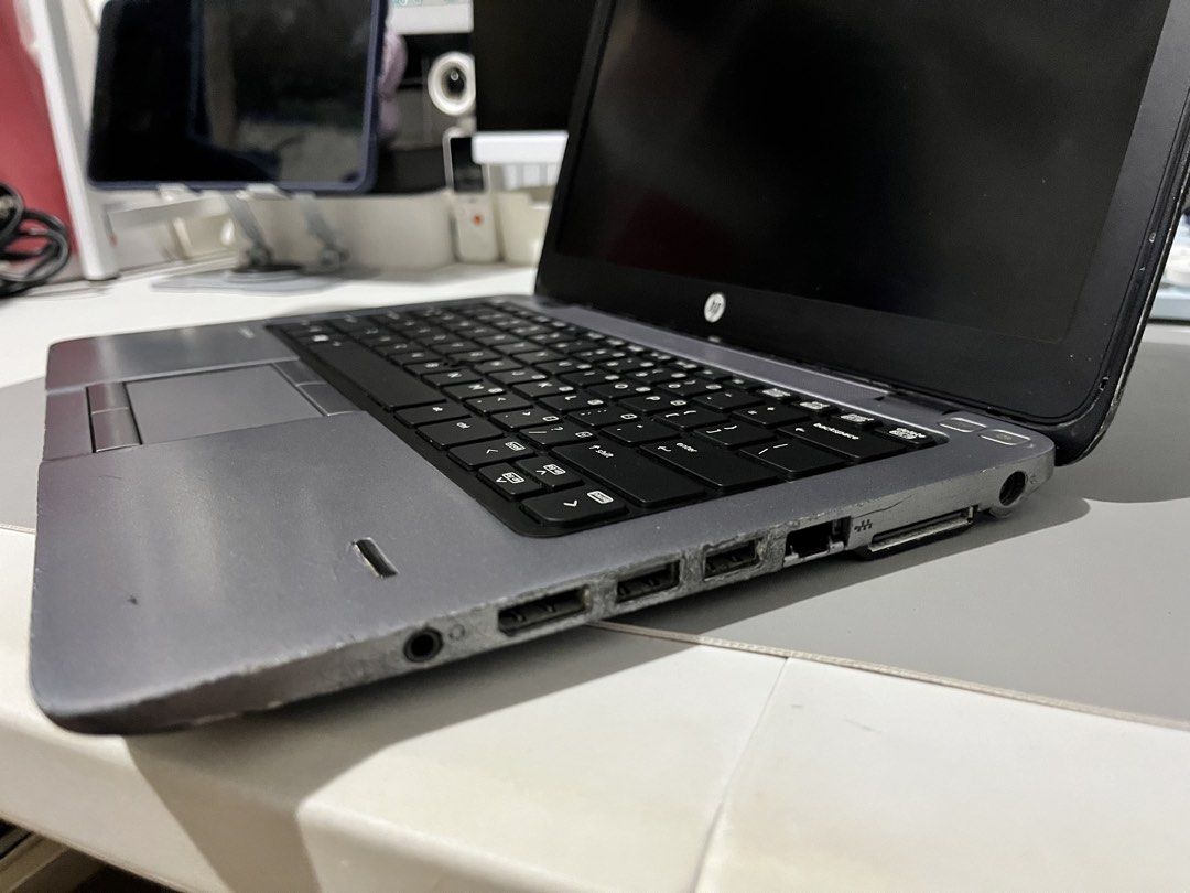 Defective HP EliteBook 820 Laptop (Category: Laptops & Notebooks) located in Pasay City. Submitted by pitchiiieee_ (Listing ID 1467264605, Image 3). Description: 3,500 free sf NO OS Unable to reset with BIOS Password Buy at your own risk - Model: HP EliteBook 820 Business Laptop - Color: Black outer casing with grey interior deck - Features: Built-in webcam, standard touchpad, and multiple USB and connectivity ports - Condition Notes: Visible scu