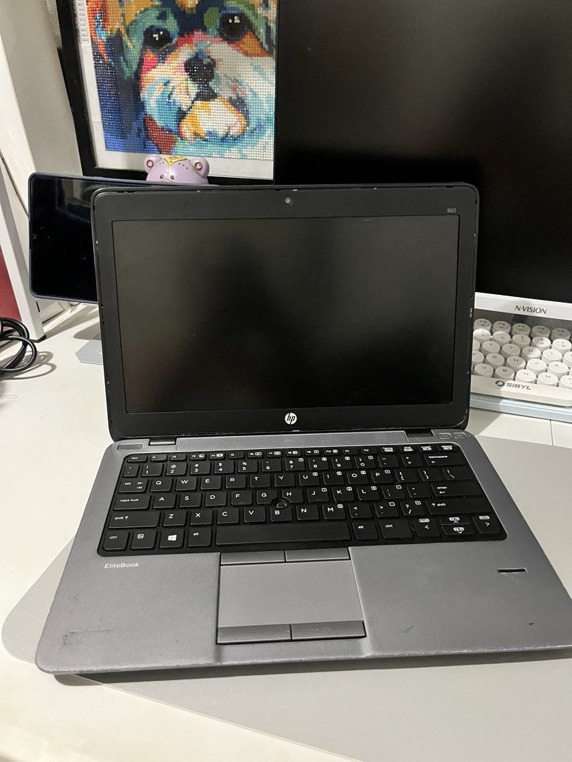Defective HP EliteBook 820 Laptop (Category: Laptops & Notebooks) located in Pasay City. Submitted by pitchiiieee_ (Listing ID 1467264605, Image 2). Description: 3,500 free sf NO OS Unable to reset with BIOS Password Buy at your own risk - Model: HP EliteBook 820 Business Laptop - Color: Black outer casing with grey interior deck - Features: Built-in webcam, standard touchpad, and multiple USB and connectivity ports - Condition Notes: Visible scu
