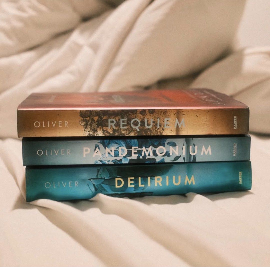 Delirium Trilogy by Lauren Oliver (Category: Storybooks) located in Balete. Submitted by pizzapay (Listing ID 1467326420, Image 1). Description: RFS: Decluttering • I sell the whole series for P500, P199 per book. • All the books are authentic. • There are yellow staining on the pages, and some wavy pages due to wet staining (ask me for photos), but other than that, the book is all good..