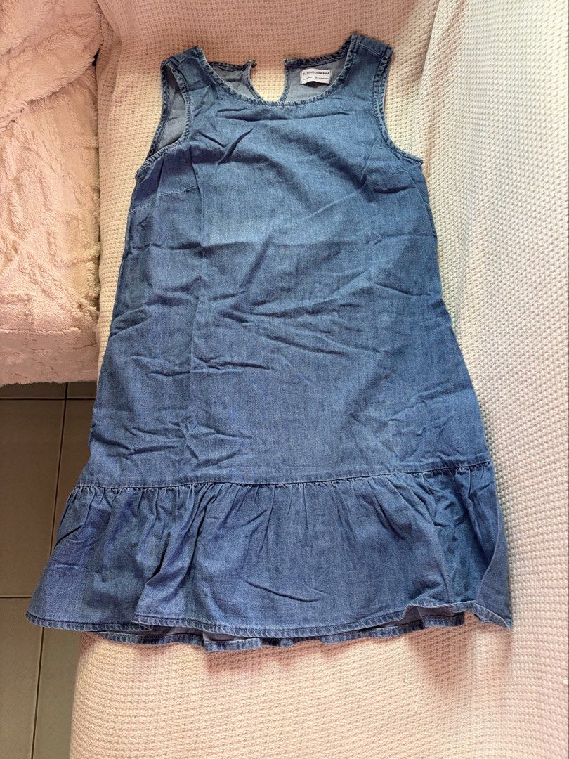 Denim Sleeveless Ruffle Hem Dress (Category: Dresses) located in Manila. Submitted by amilannnn (Listing ID 1467197113, Image 2). Description: - Brand/Style: Tamnoon Denim Sleeveless Dress - Color/Wash: Medium wash blue - Size: Small to Medium (M) - Details: Round neckline, back button closure, trendy ruffle hem - Fabric: Lightweight denim - Condition: Great casual piece for warm weather -used only once.