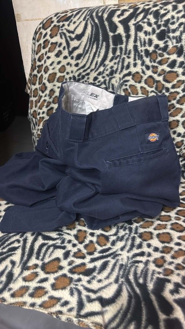 Dickies Flex Work Pants Navy Blue (Category: Trousers) located in Manila. Submitted by lawrence_escutin (Listing ID 1467329234, Image 2). Description: - Brand/Model: Dickies 874 original fit Flex Work Pants - Color: Navy Blue - Fit: Classic straight leg with button and zipper fly - Comfort: Stretch fabric inside waistband - Pockets: Back pockets with button closure on the left side - Details: Iconic Dickies logo patch above the right back pocket 