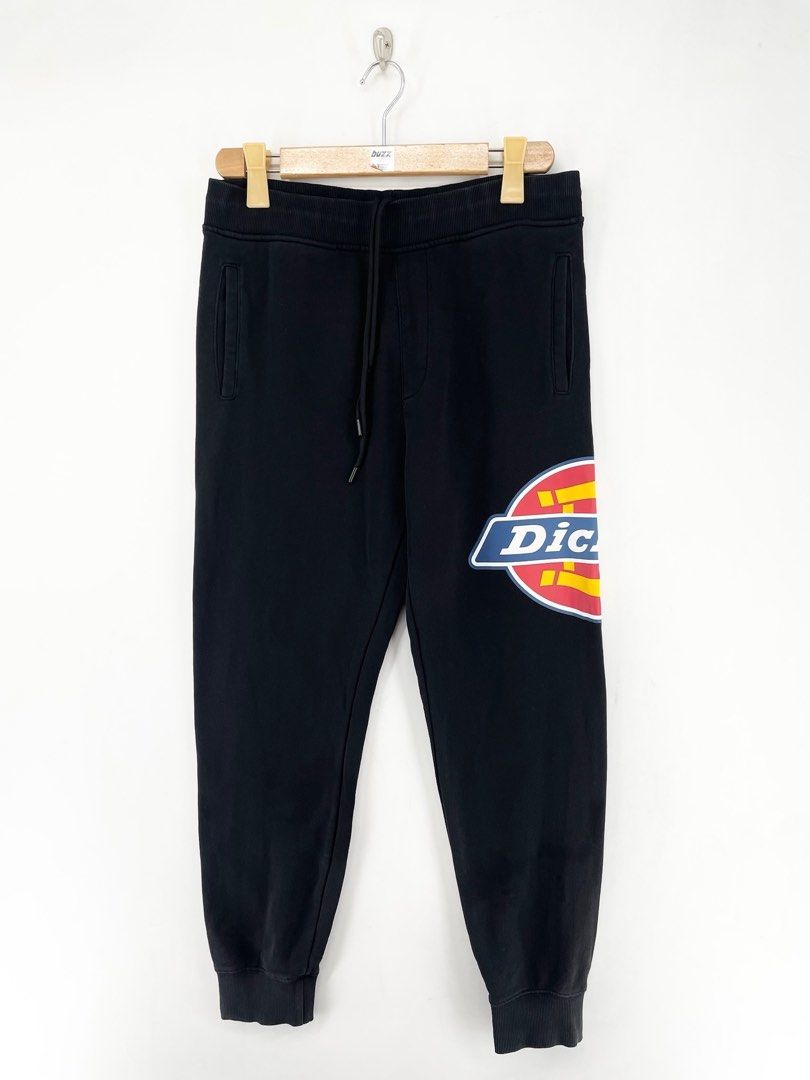 Dickies Side Logo Black Jogger Pants (Category: Joggers) located in Manila. Submitted by buzz.garments (Listing ID 1467353659, Image 1). Description: Size: Medium on tag Dimensions(inches) -Waist/Width: 32”-38” (Strechable) -Hip: 19” -Front Rise: 13” -Thigh: 10” -Inseam: 25” -Outseam/Length : 35” -Leg Opening: 4” - color may vary due to lighting. please manage your expectations-minimal and unseen flaws must be considered..