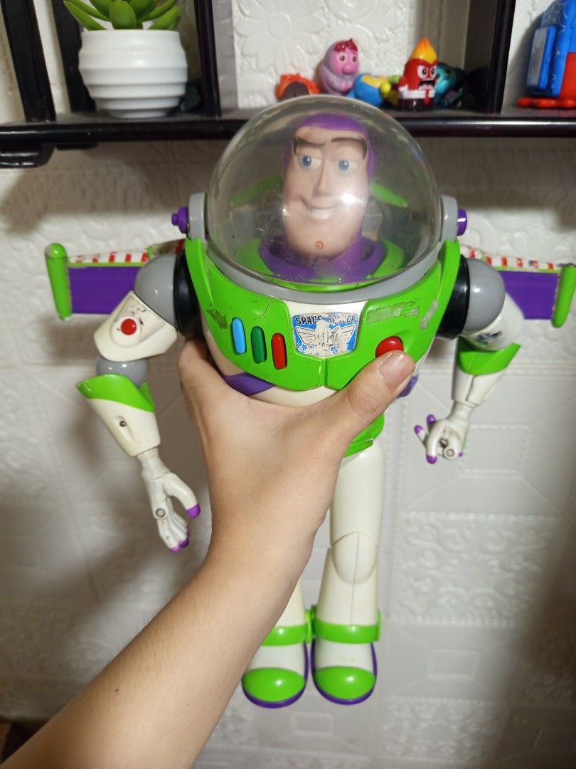 Disney Pixar Buzz Lightyear (Toy Story) (Category: Action & Battle Toys) located in Manila. Submitted by koomimi_ (Listing ID 1467202395, Image 1). Description: FOR SALE: Disney Pixar Buzz Lightyear - Andy written on the shoes - Untested, sold as is - Please see photos for actual condition PM for inquiries..