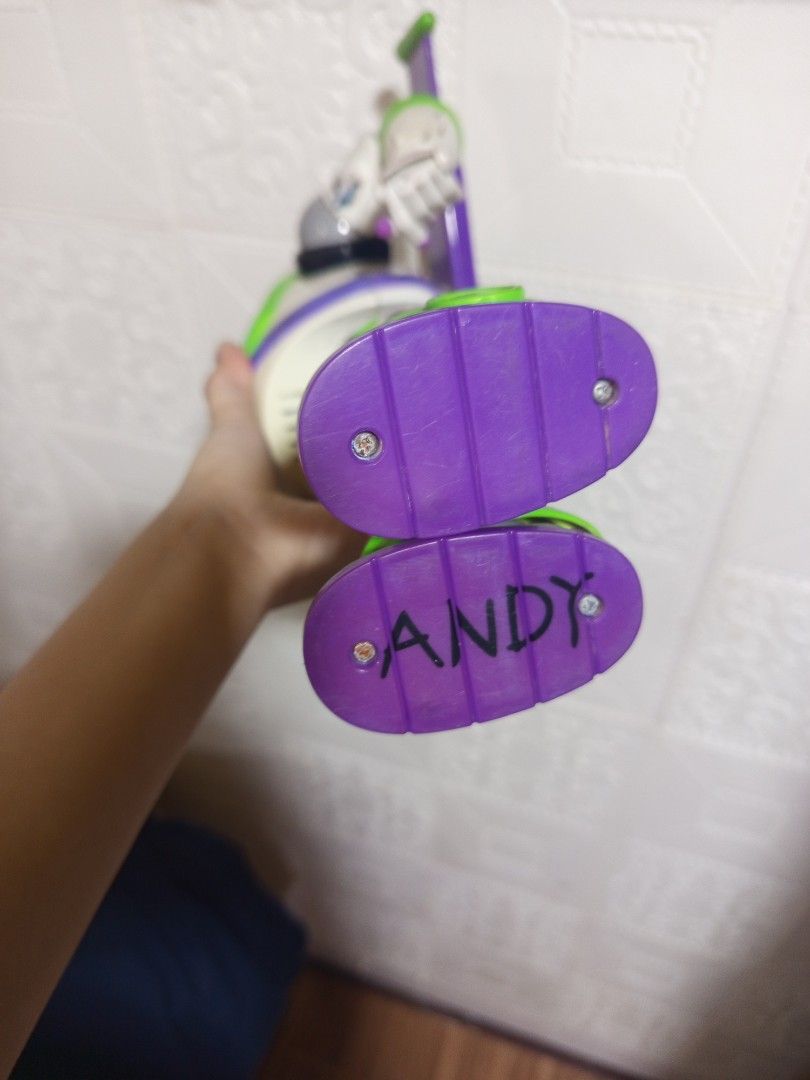 Disney Pixar Buzz Lightyear (Toy Story) (Category: Action & Battle Toys) located in Manila. Submitted by koomimi_ (Listing ID 1467202395, Image 2). Description: FOR SALE: Disney Pixar Buzz Lightyear - Andy written on the shoes - Untested, sold as is - Please see photos for actual condition PM for inquiries..