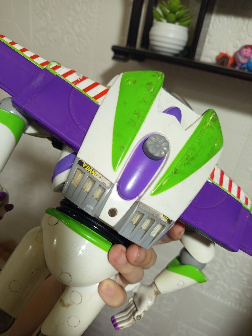 Disney Pixar Buzz Lightyear (Toy Story) (Category: Action & Battle Toys) located in Manila. Submitted by koomimi_ (Listing ID 1467202395, Image 3). Description: FOR SALE: Disney Pixar Buzz Lightyear - Andy written on the shoes - Untested, sold as is - Please see photos for actual condition PM for inquiries..
