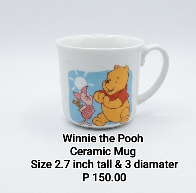 Disney Winnie the Pooh Ceramic Mug (Category: Coffee & Tea Tableware) located in Binan City. Submitted by mayjhe (Listing ID 1467201490, Image 1). Description: 💛 For Sale 💛 🌸 Disney Winnie the Pooh 🍀 Ceramic Mug 📍 Condition: Good 💰 Price is ₱ 150.00 👉 Other details posted 🇵🇭 Location Biñan Laguna 🛵 Courier J& T and Lalamove 📋 Shipping by schedule 📍 NO COD & COP 📌 All items are carefully packed and labeled with Fragile stickers for br