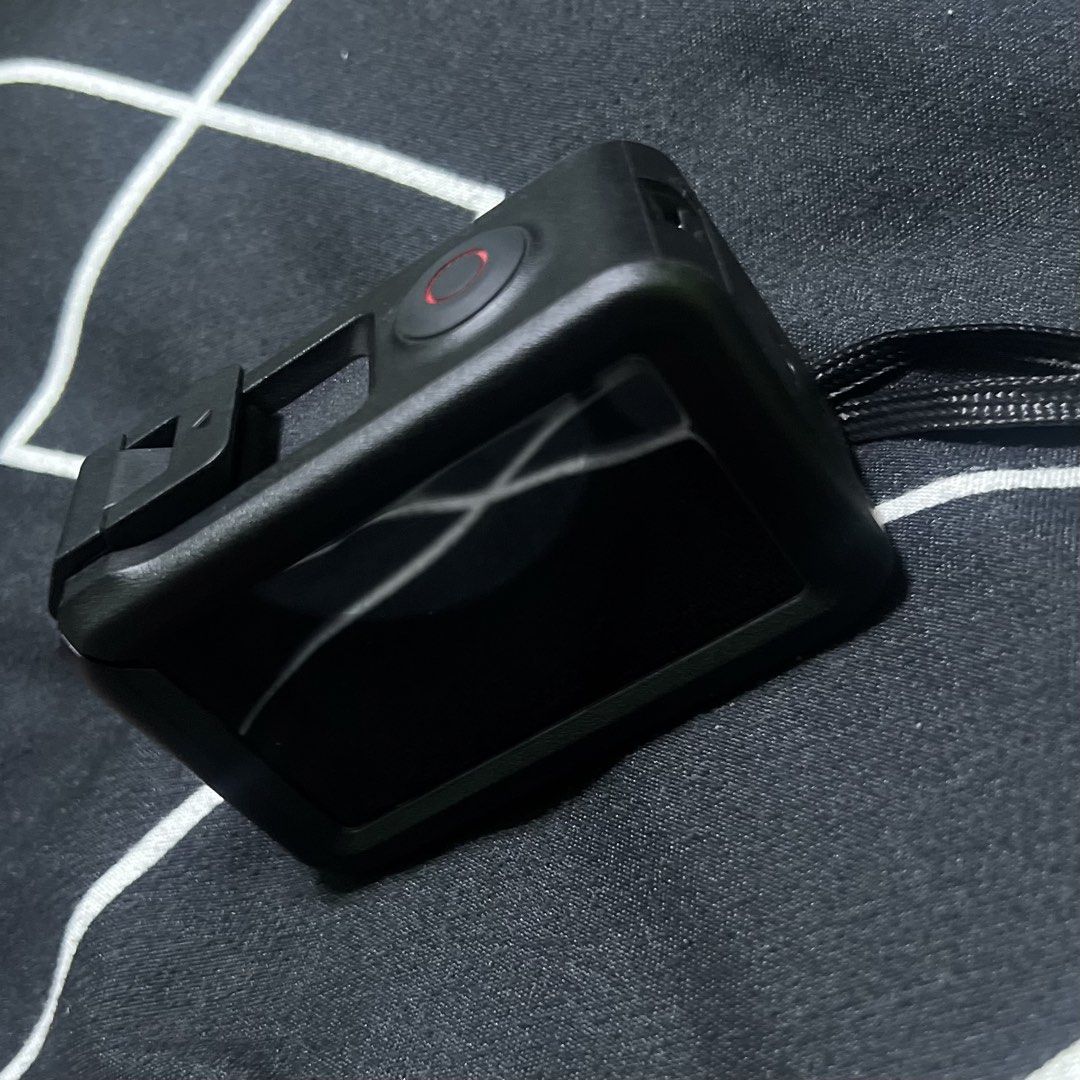 DJI OSMO Action 4 Camera (Category: Other Gadgets) located in Quezon City. Submitted by HeyitsEya (Listing ID 1467229188, Image 3). Description: 📸 FOR SALE: DJI OSMO ACTION 4 + COMPLETE ACCESSORIES Selling my personal DJI Osmo Action 4, only 4 months old! Perfect for newbie at travel vlogging, motorcycle rides, outdoor adventures, sports, and content creation. 🎥 Get more than just the camera — this package comes with extra batteries, a power ca