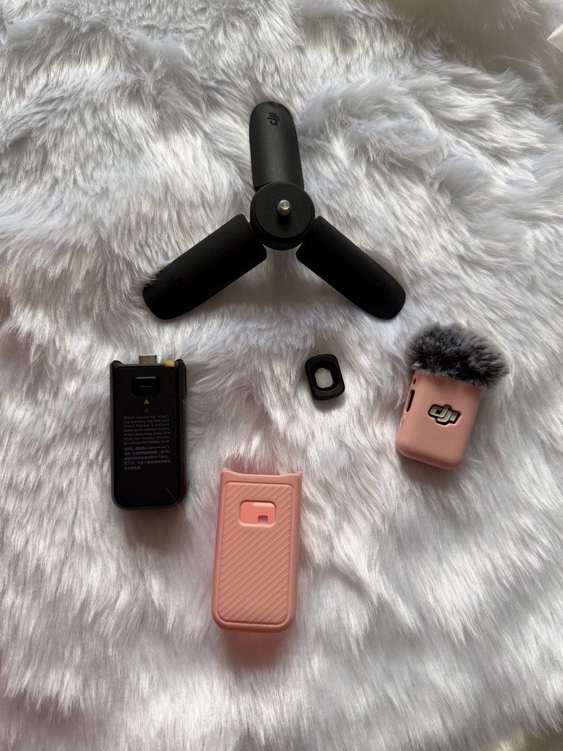 DJI Osmo Pocket 3 Accessories ONLY! (Category: Cameras) located in Paranaque City. Submitted by ulscxz18 (Listing ID 1467205085, Image 2). Description: - DJI Osmo Pocket 3 Essential Accessories Bundle - Black mini tripod for stable, shake-free shots - Battery handle with USB-C connection for extended shooting time - Small black adapter piece included - Two pink protective silicone cases to keep your gear safe - One silicone case comes with an att