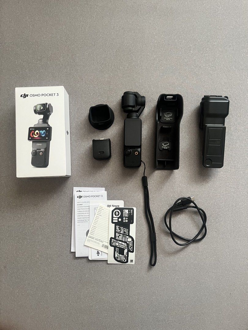 DJI Osmo Pocket 3 Creator Combo (Category: Cameras) located in Muntinlupa City. Submitted by ahayruuuh (Listing ID 1467274920, Image 1). Description: - Item: DJI Osmo Pocket 3 setup - Condition: Tested, works normally, clear screen, minimal handling marks, mostly kept in storage - Inclusions: Original box, protective case, handle, wrist strap, charging cable, manuals - Ideal for: Travel and daily video recording - Reason for selling: Rarely used.