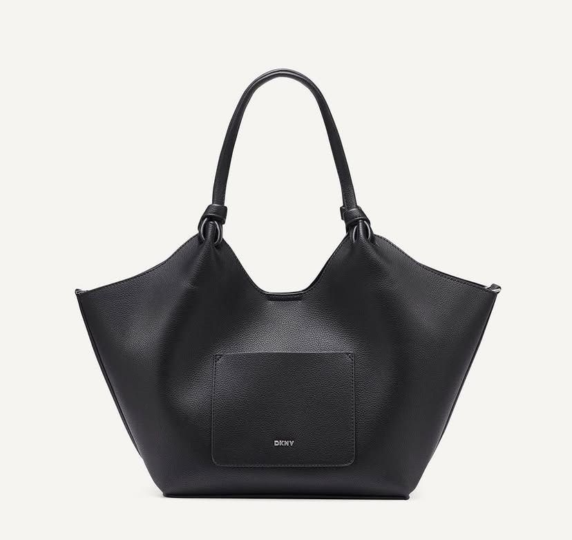 DKNY Paula Star (Category: Luxury Bags & Wallets) located in Muntinlupa City. Submitted by mabelleadr46801 (Listing ID 1467274170, Image 2). Description: Fresh from 🇨🇦 🍁 DKNY Paula Star-Embellished Tote (or similar star-studded commuter tote) in black or dark blue with silver-tone star studs. Key Features • Brand: DKNY (Donna Karan New York) • Design: Slouchy tote silhouette with double shoulder/top handles and scattered silver star embellishm