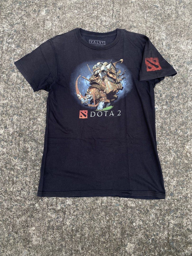 Dota (Category: Tshirts & Polo Shirts ) located in Manila. Submitted by thrift_neo (Listing ID 1467298159, Image 3). Description: DOTA 2 BLACK official printed tag valven Size m on tag Dimes 19x28.5 Good condition Issue:good fade,hairlines crack Official printed tag Size xl on tag Dimes 24x30 Good condition Issue:faded shirt, Thin fabric due to usage,hairlines crack,pinhole.
