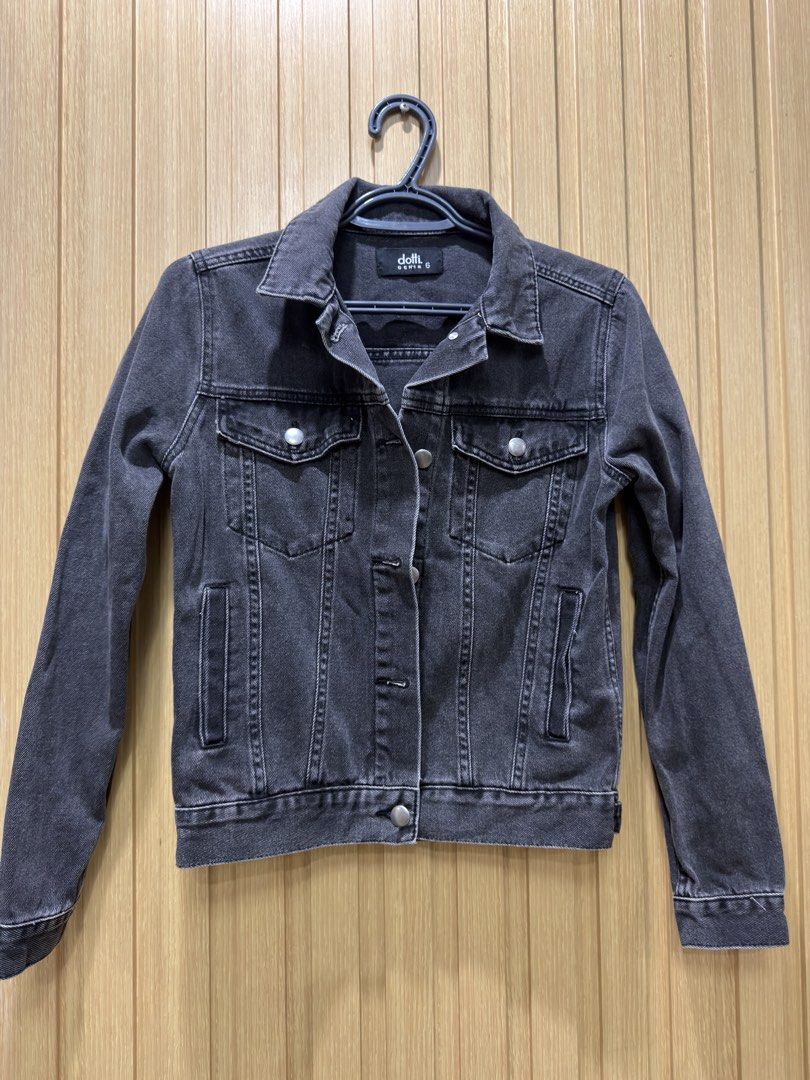 Dotti Denim Black Denim Jacket Size 6 (Category: Coats, Jackets and Outerwear) located in Bacoor. Submitted by preloved_with_love_ (Listing ID 1467334867, Image 1). Description: - Brand: Dotti - Color: Washed black - Size: 6 (tag attached) - Measurements: 16 inches width, 20 inches length - Features: Classic button-up front, chest pockets, and side welt pockets - Material: Sturdy denim - Condition: Brand new with tags.