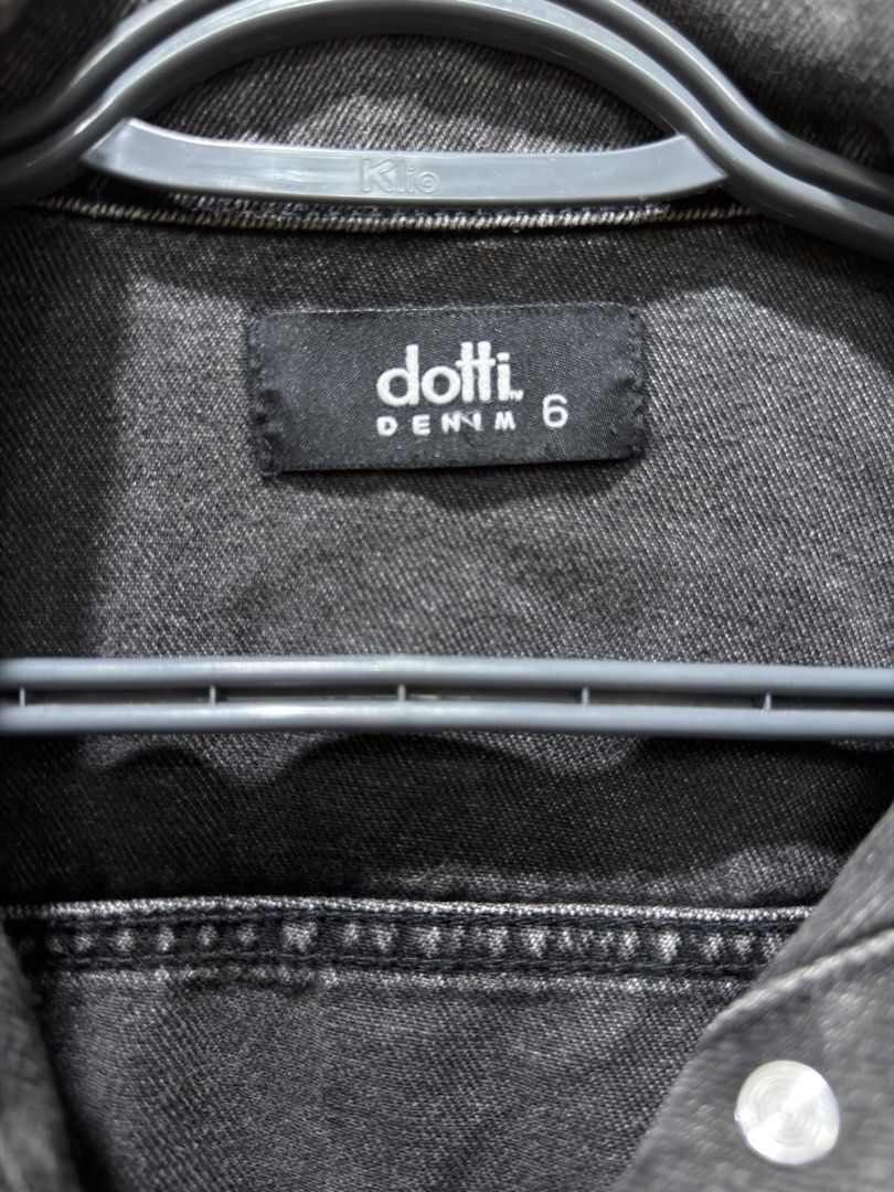 Dotti Denim Black Denim Jacket Size 6 (Category: Coats, Jackets and Outerwear) located in Bacoor. Submitted by preloved_with_love_ (Listing ID 1467334867, Image 3). Description: - Brand: Dotti - Color: Washed black - Size: 6 (tag attached) - Measurements: 16 inches width, 20 inches length - Features: Classic button-up front, chest pockets, and side welt pockets - Material: Sturdy denim - Condition: Brand new with tags.