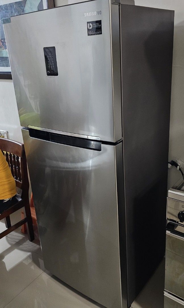 Double Door Refrigerator Fridge Clean Interior Storage (Category: Refrigerators and Freezers) located in Manila. Submitted by ipmansifu (Listing ID 1467171839, Image 3). Description: - Type: Double door fridge with stylish stainless steel exterior - Interior: Clean white finish with adjustable shelves and clear door bins - Capacity: Spacious storage for food, drinks, and condiments - Condition: Main fridge is working cold as new. Main issue is th
