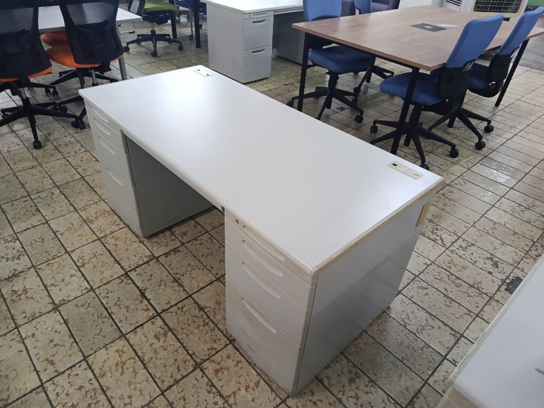 Double Pedestal Office Desk (Category: Office Furniture & Fixtures) located in Quezon City. Submitted by kevinmacabata12997160 (Listing ID 1467361437, Image 2). Description: - Sturdy double pedestal office desk in a sleek grey finish - 6 spacious drawers total (3 on each side) for maximum storage - Built-in cable management slots to keep your tabletop neat - Heavy-duty build designed for daily office use and organizing paperwork - Includes matchi