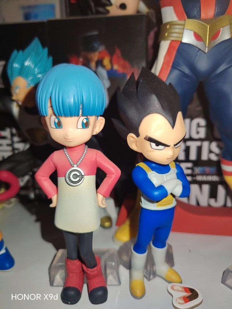 Dragon Ball Bulma and Vegeta Action Figures (Category: Figurines & Statues) located in Manila. Submitted by francescla70567 (Listing ID 1467325845, Image 1). Description: - Authentic Dragon Ball figure set including Bulma and Vegeta - Bulma features blue hair, Capsule Corporation pink top, and red boots - Vegeta is styled in his classic Saiyan battle armor with crossed arms - Includes clear plastic display bases for easy setup - Perfect addition 
