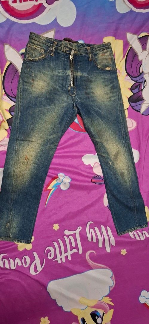 Dsquared2 D2 Rally Denim Dirty Jeans (Category: Jeans) located in Quezon City. Submitted by robertlimbao (Listing ID 1467251385, Image 3). Description: - Brand: Dsquared2 - Origin: Made in Italy Size on tag 40 In Tape Measure 16inch canfit to 32 Length is 36 inches - Wash/Treatment: Heavyweight denim with authentic vintage Distressed Dirty Jeans treatment, distressed details, and factory fading - Details: 'D2 Rally Denim Dirty' leather back patch