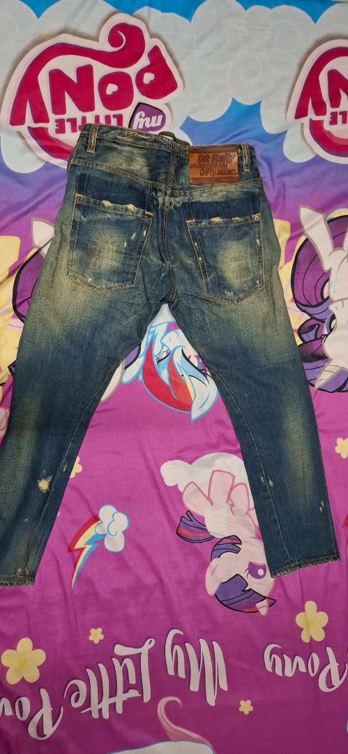 Dsquared2 D2 Rally Denim Dirty Jeans (Category: Jeans) located in Quezon City. Submitted by robertlimbao (Listing ID 1467251385, Image 2). Description: - Brand: Dsquared2 - Origin: Made in Italy Size on tag 40 In Tape Measure 16inch canfit to 32 Length is 36 inches - Wash/Treatment: Heavyweight denim with authentic vintage Distressed Dirty Jeans treatment, distressed details, and factory fading - Details: 'D2 Rally Denim Dirty' leather back patch
