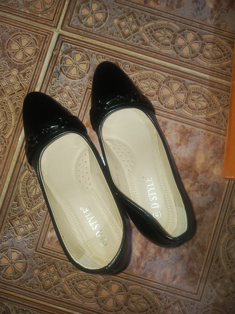 DStyle Black Shoes size 40 bundle (Category: Heels) located in Malasiqui. Submitted by shop.bea (Listing ID 1467286351, Image 1). Description: - Brand: D STYLE - Color: Black - Style: Pointed toe heels with slip-on design and decorative front buckle strap - Heel: Stable block heel for comfortable walking - Size: 40 (marked on insoles and outsoles) - Condition: Brand new, clean soles with zero wear marks - Inclusion: Original orange D STYLE shoe b