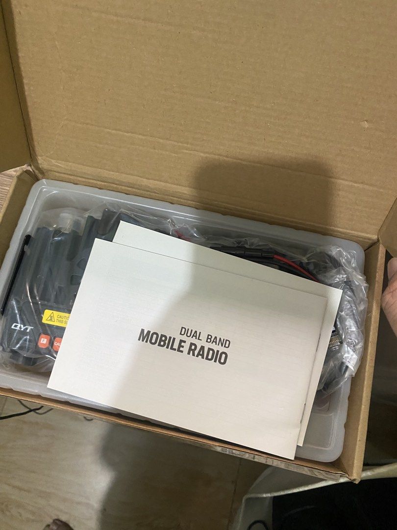 Dual Band Mobile Radio (Category: Walkie-Talkie) located in Paranaque City. Submitted by alphaninerdelta27 (Listing ID 1467274036, Image 2). Description: - Brand new, unused QYT KT-8900 dual band mobile radio in original box - Includes main unit, mounting bracket, DTMF microphone, power cable with cigarette lighter plug, and user manual - Advanced features support remote stun, remote kill, and remote wake - Equipped with 2-tone, 5-tone, DTMF, and
