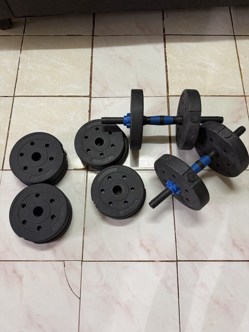 Dumbbells with weights (Category: Weights & Dumbbells) located in Caloocan City. Submitted by zeariambon (Listing ID 1467192840, Image 3). Description: Inclusions: 2 Dumbbells (4) 2kg plate (4) 1.5kg plate (4) 1.25kg plate.