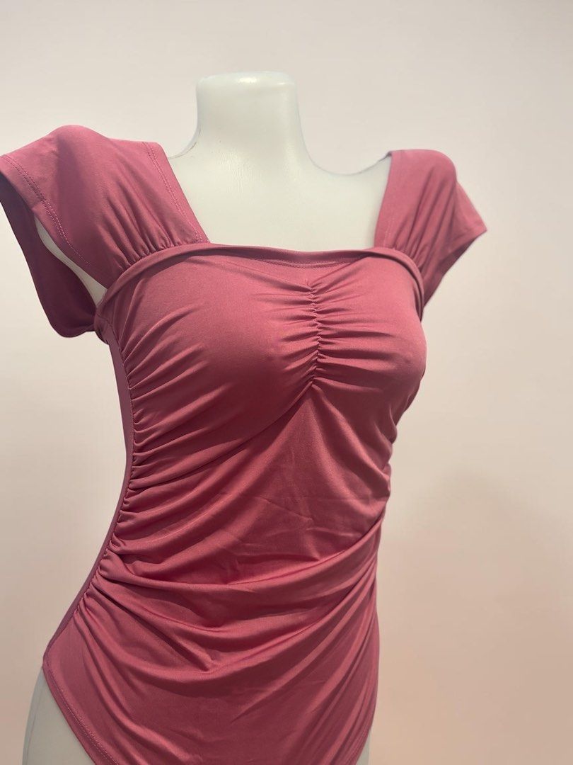 Dusty Pink Ruched Cap Sleeve Bodysuit (Category: Sleeveless) located in Santa Cruz. Submitted by homedecluttersale (Listing ID 1467355672, Image 2). Description: • Used / Excellent condition • Fits small to medium • Photos taken using mannequin only 🚚 Shipping via J&T only 📦 Shipping fee to be shouldered by buyer 💳 Mode of payment: GCash 📍 Santa Cruz, Laguna.