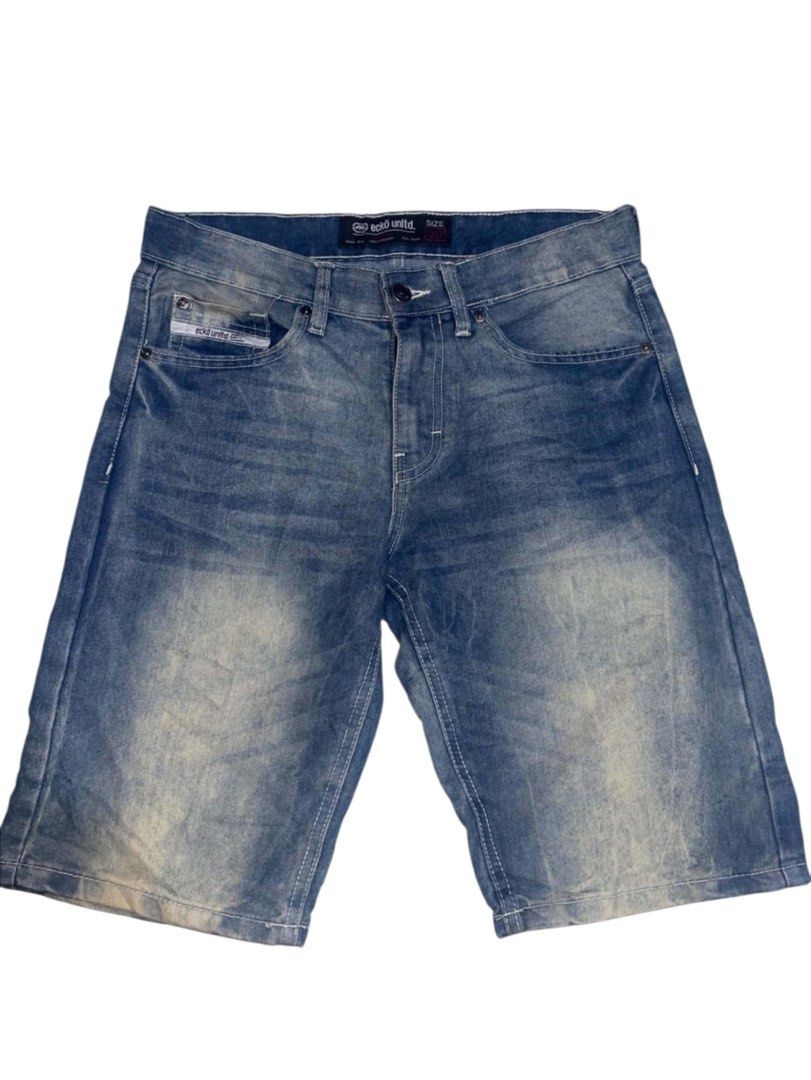 Ecko Unld. Denim Shorts Size 30 (Category: Shorts) located in Manila. Submitted by fastforest_65f95b (Listing ID 1467289565, Image 1). Description: - Brand: Ecko Unld. - Size: 30 - Color/Wash: Blue denim with acid wash finish and fading - Details: Classic five-pocket layout, white contrast stitching - Hardware: Branded metal button closure and zip fly - Branding: Small fabric logo patch on coin pocket and leather brand patch on back waistband.