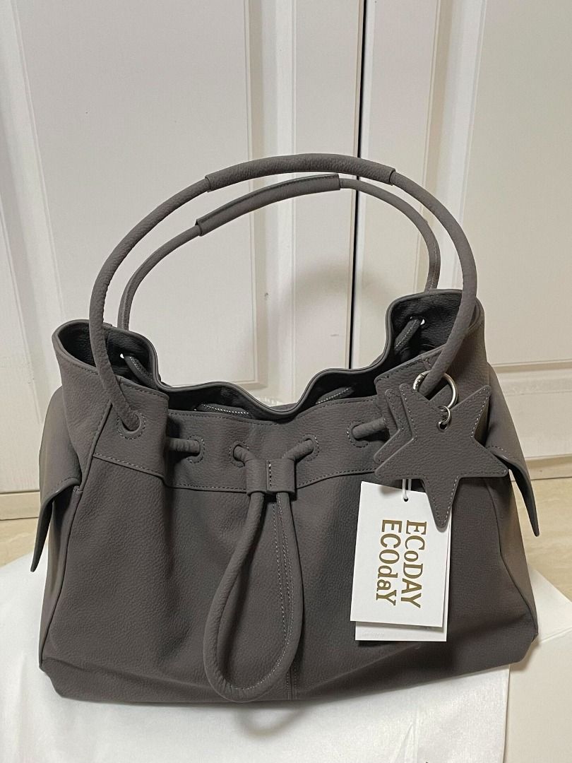 ECODAY Cozy Drawstring Bag - Multiple Colors - Large/Small | COC-1045876858719 (Category: Shoulder Bags) located in Manila. Submitted by coco_lifeph (Listing ID 1467289137, Image 1). Description: ECODAY Cozy Drawstring Bag. Type: Shoulder Bag. Color: Gray; Chestnut; Caramel Brown; Berry Red. Material: PU leather. Available size(s): Large; Small. Closure: Drawstring. Condition: New..