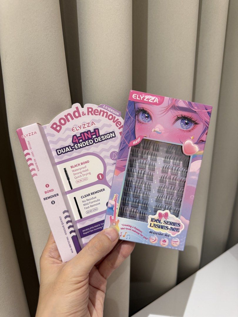 Elyzza Idol Series Lashes-Ace and Bond & Remover Duo (Category: Makeup) located in Quezon City. Submitted by anneyoung22 (Listing ID 1467260260, Image 1). Description: - Brand new and unopened Elyzza Idol Series Lashes-Ace set - Includes a full set of gorgeous cluster lashes - Features a 4-in-1 dual-ended tool with waterproof black bond and clear remover - Long-lasting 48+ hour hold - Safe, latex-free, and non-clumpy formula - 100% unused and in 