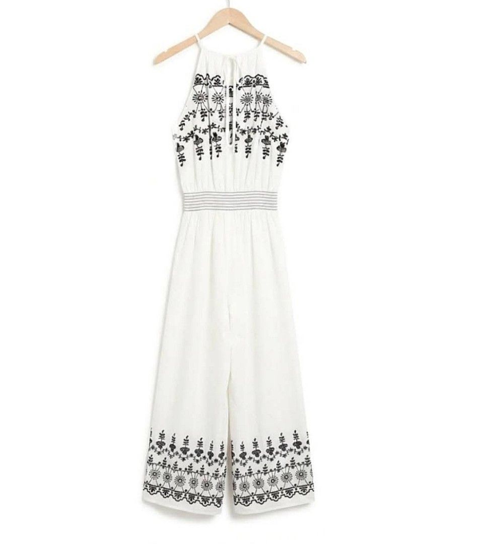 Embroidered floral boho halter jumsuit (Category: Jumpsuits) located in Quezon City. Submitted by panapton.ph (Listing ID 1467172741, Image 3). Description: -FLASH SALE ONLY 1,200 -Brandnew Bangkok jumpsuit -Actual item post -Size fit 34 to 44bust -Design & Style: Halter neckline with keyhole back-tie closure -Elasticized/smocked high waist for a flattering, flexible fit 28 to 34waistline -​Leg Cut: Wide-leg culotte silhouette -Color: Off-White w