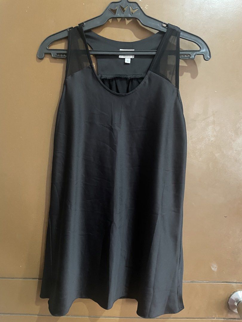 Encore Black Sleeveless Tank Top Size S (Category: Sleeveless) located in Manila. Submitted by mochi_dear (Listing ID 1467211856, Image 1). Description: - Brand/Item: Encore black sleeveless tank top - Size: Small - Design: Sheer mesh panels on upper shoulders with a rounded neckline - Details: Gathered fabric detail across the back - Fit: Flowy cut made from lightweight material - Versatility: Great basic piece for layering or wearing on warm da