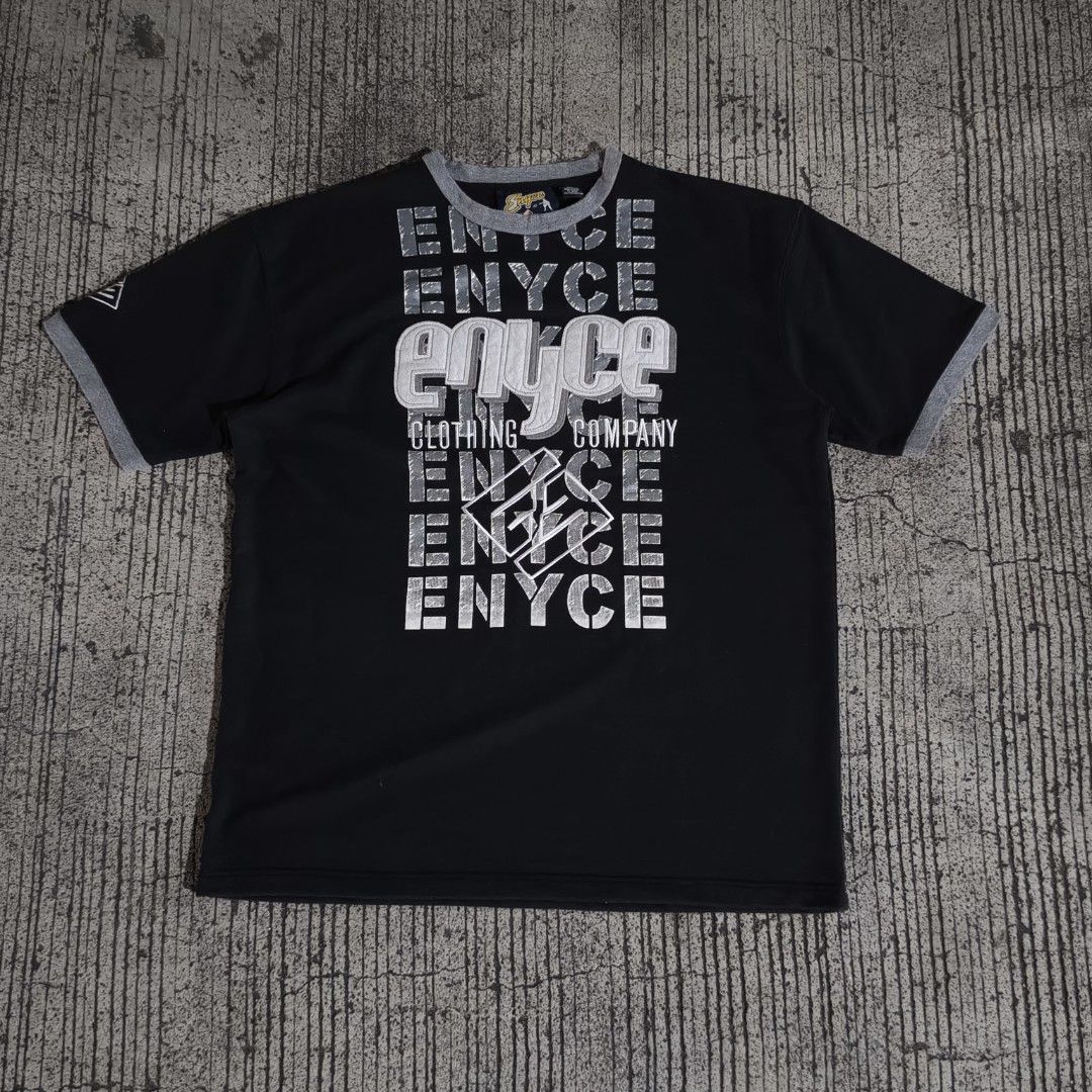 Enyce Clothing Company (Category: Tshirts & Polo Shirts ) located in Manila. Submitted by tondoswag (Listing ID 1467228444, Image 1). Description: Enyce Clothing Company (stack logo graphic on the chest) Color rate: 10/10 Condition: 10/10 issue: (None) measurements (measured by inches) width - 26 length - 32.