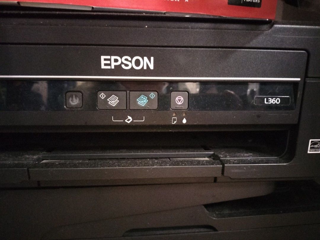 Epson L360 All-in-One Ink Tank Printer (Category: Printers, Scanners & Copiers) located in Manila. Submitted by coco_lifeph (Listing ID 1467237099, Image 1). Description: - Model: Epson L360 Multifunction Printer (Print, Scan, Copy) - Color: Black housing with a clean, functional control panel - Condition: Fully functional, powers on reliably, and handles daily document tasks with ease - Note: Minor dust marks around the paper tray from normal of