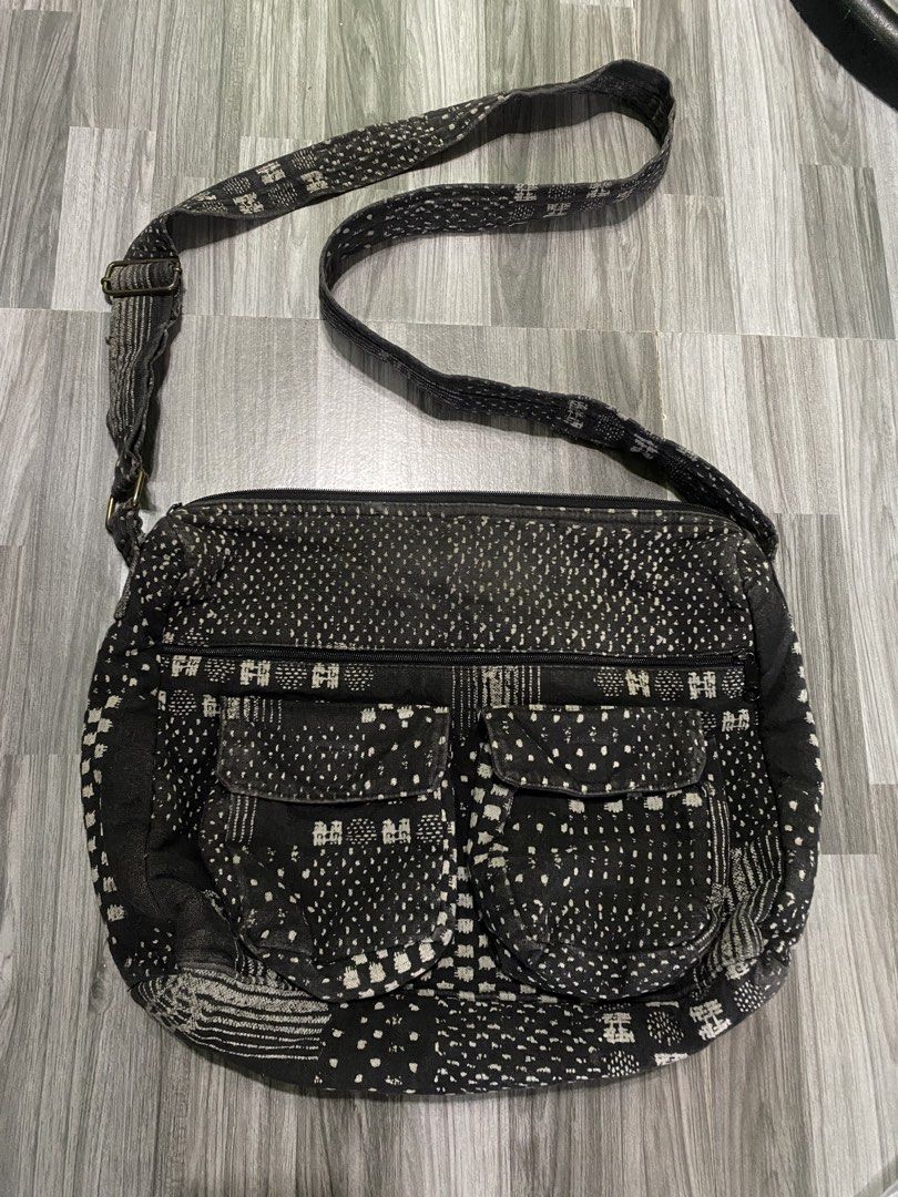 Etnik denim style Sling Bag Black (Category: Cross-body Bags) located in Antipolo. Submitted by marcoandpaolomerchandise (Listing ID 1467358089, Image 1). Description: Etnik Black Sling Bag Cloth Bag Makapal Preloved Good Condition Need ng wash due to storage. Naalikabukan lang ng konti May stitch na brown sa strap , Hindi sya Sira mukang tinahi lang para firm yung strap Daming Compartment 2 mini Pocket sa Front ( Tape Lock ) 1 zipper Pocker Fron