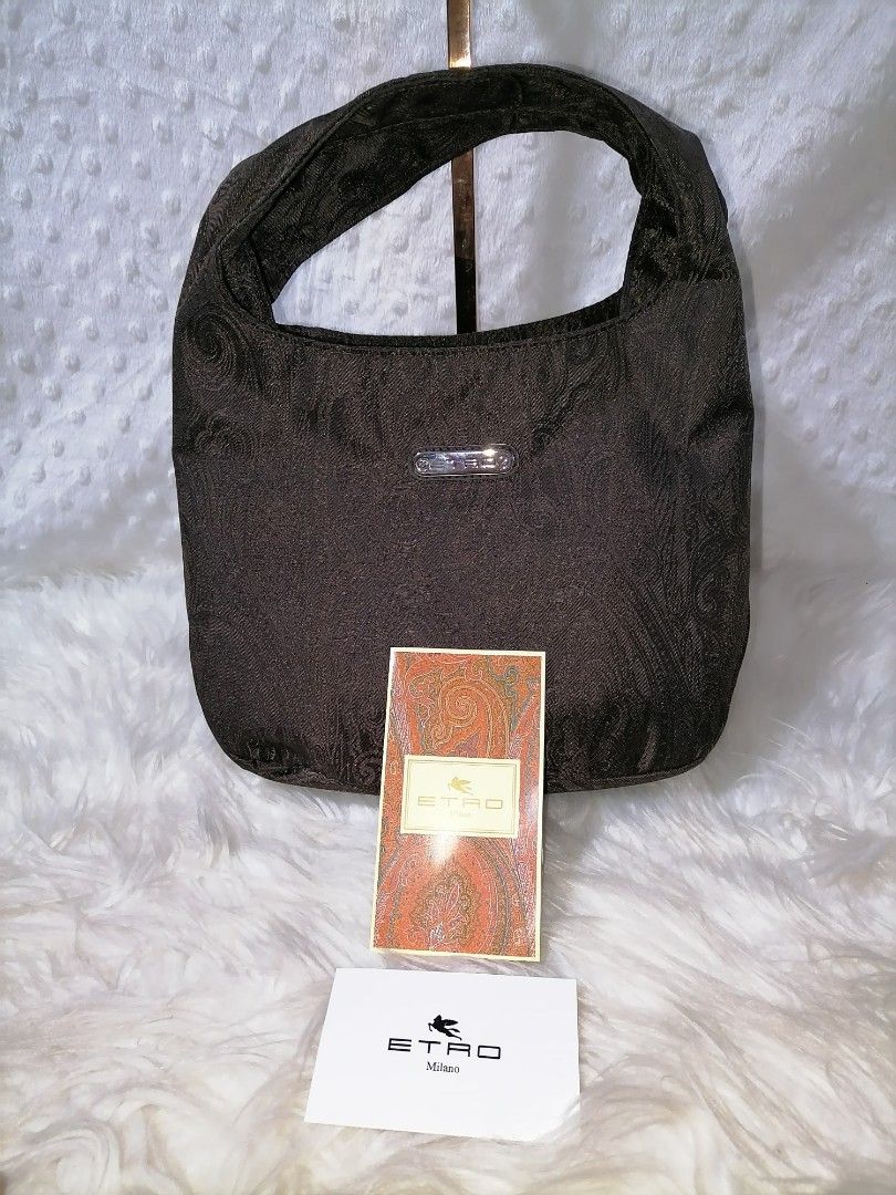 Etro Hand Bag (Category: Purses & Pouches) located in Butuan. Submitted by az-branded.items (Listing ID 1467182499, Image 1). Description: Size: W 9" x L 7" x Bottom 5" New with cards Authentic item From Japan.