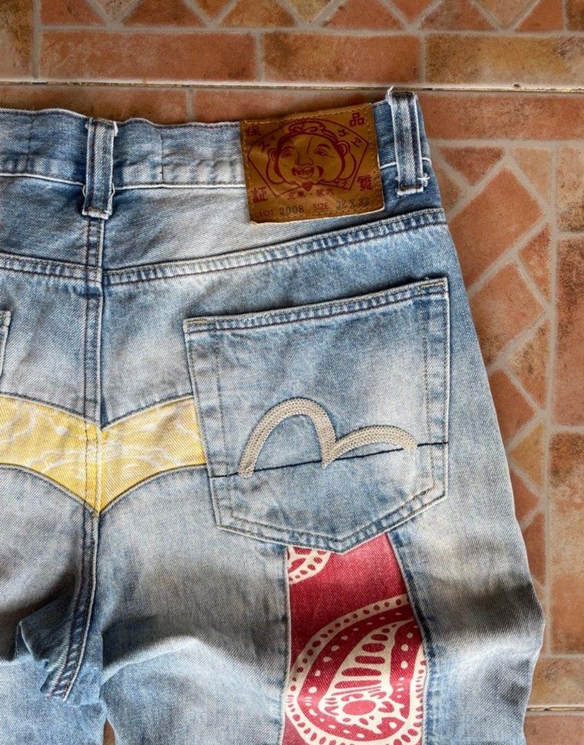 Evisu Lot 2008 Patchwork Denim Jeans Size 32 (Category: Jeans) located in Cainta. Submitted by cjooor (Listing ID 1467312038, Image 3). Description: - Brand: Evisu Lot 2008 - Size: 32 - Color/Wash: Light blue - Fit: Straight fit - Key Features: Unique patchwork styling with red and blue paisley patterns on the back legs - Details: Signature embroidered seagull motifs on back pockets and leather brand patch at waistband - Condition: Excellent buye