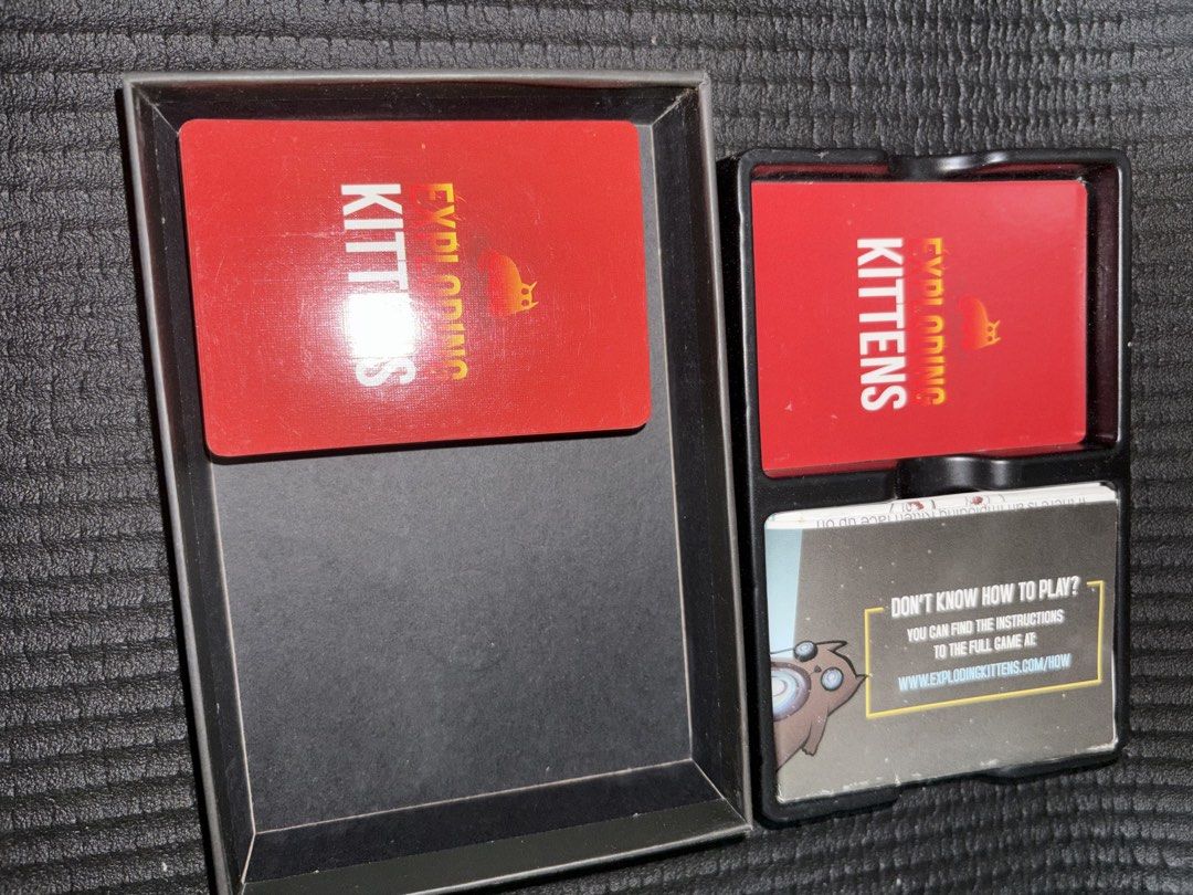 Exploding Kittens Card Game with Imploding Kittens DLC (Category: Board Games & Puzzles) located in Quezon City. Submitted by colonelbirb (Listing ID 1467351369, Image 3). Description: - Game: Exploding Kittens by Elan Lee, Matthew Inman, and Shane Small - Players: 2 to 5 players - Age: 7 years old and up - Playtime: Approx. 15 minutes per round - Condition: Complete with original box, plastic insert tray, full deck of cards, and instruction card