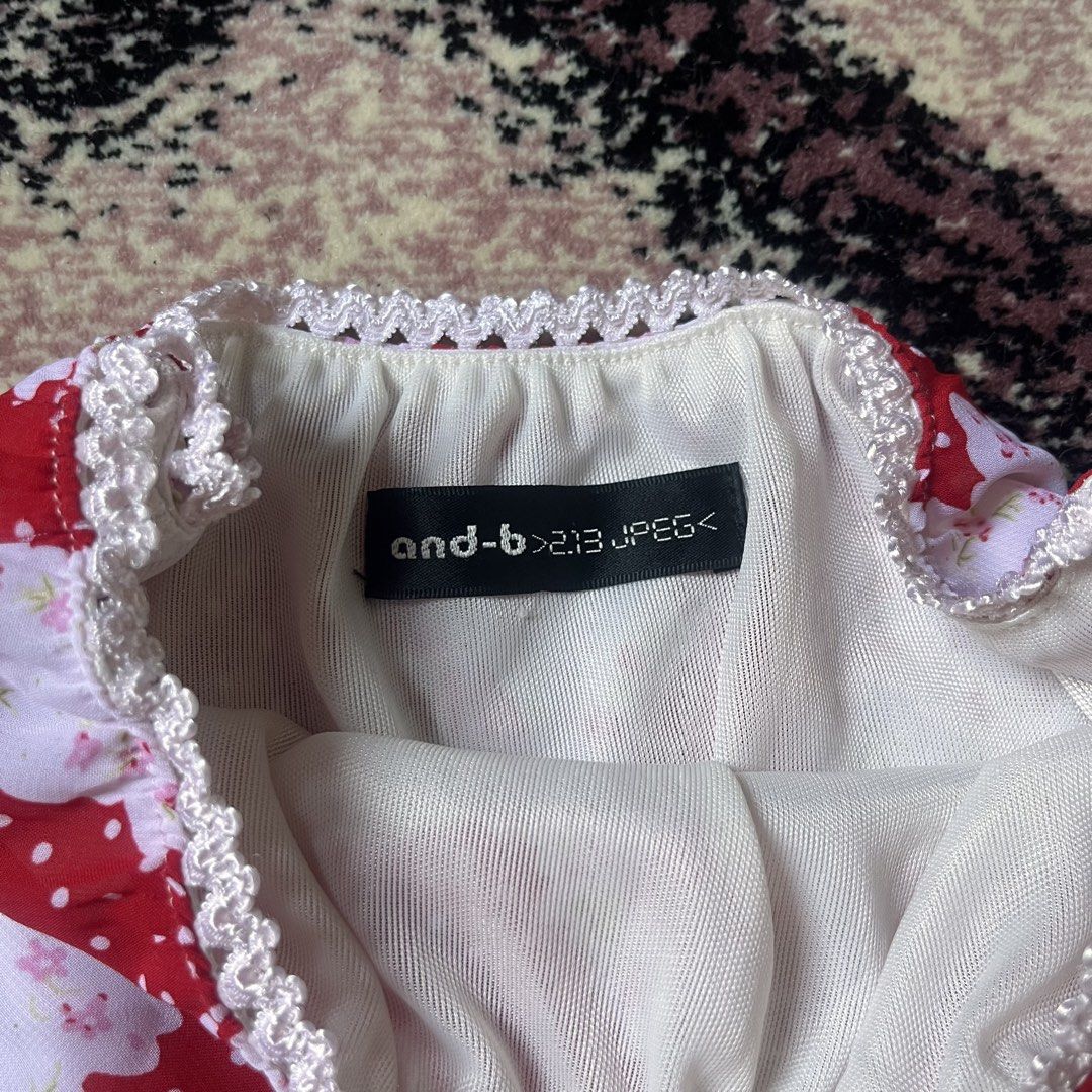 Fairycore Floral Red Asymmetrical Skirt (Category: Skirts) located in Manila. Submitted by xoxolovea (Listing ID 1467284415, Image 2). Description: waist 20” to 32” length 21” to 29” excellent to like new condition .